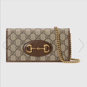 Gucci supreme wallet on a chain